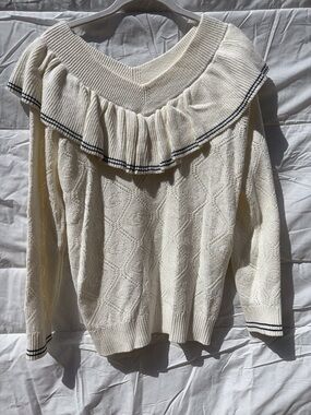 Coach Cream Off-the-Shoulder Ruffle Sweater with Black Trim